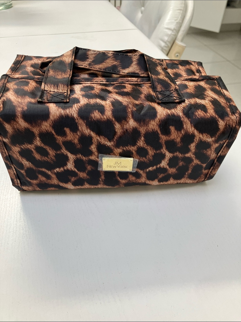 JM New York roll up travel, toiletry, and cosmetic organizer bag